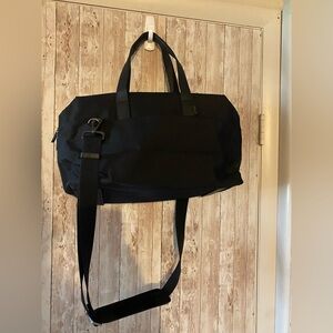 Away The everywhere bag in black travel carryon laptop bag vacation shoulder